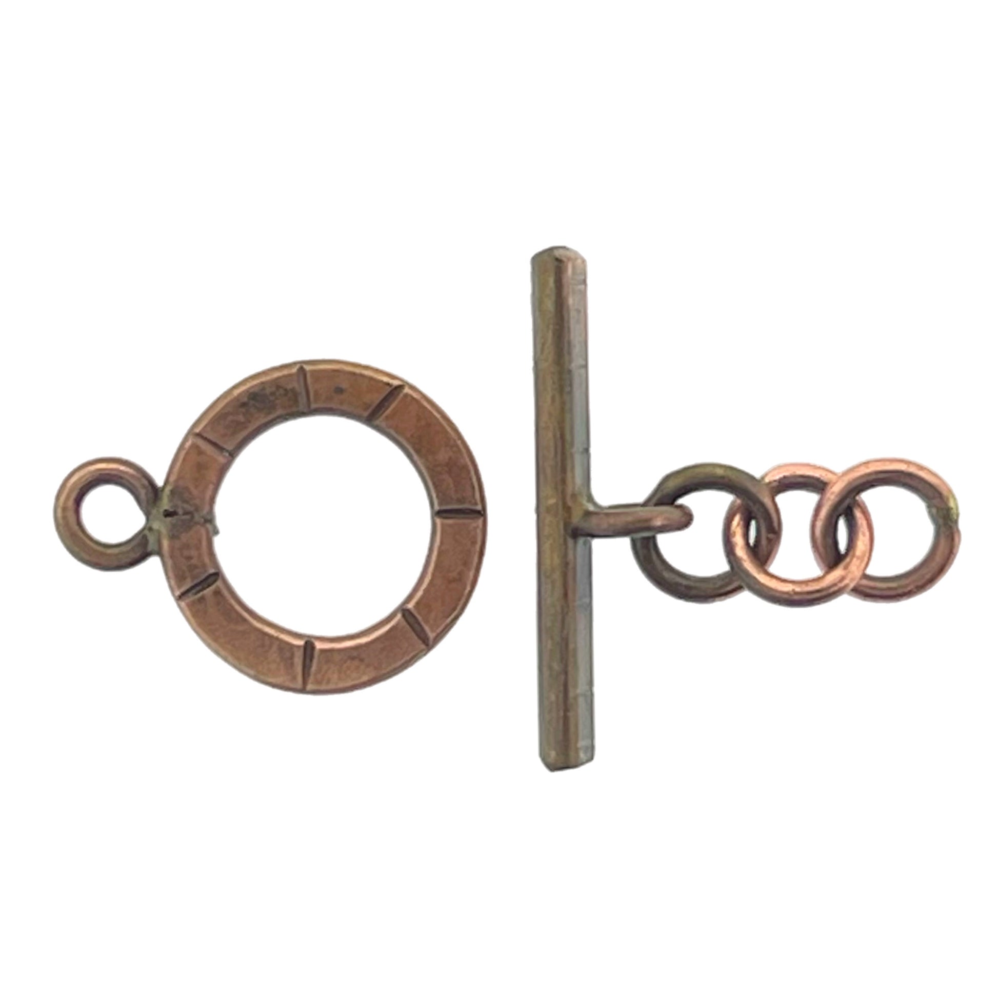 Antiqued copper small toggle clasp with a bar and a ring, featuring a lead chain, hand-stamped with intricate details.