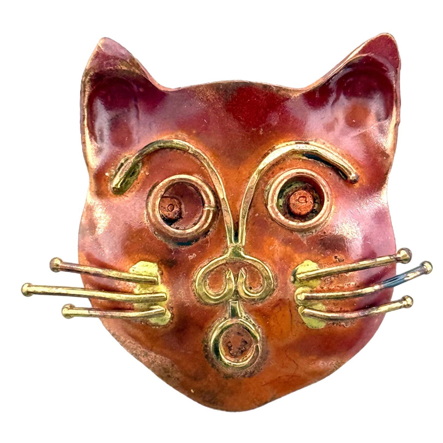 Whimsical copper and brass cat face slider with raised detailing and red patina for 10mm flat leather bracelet
