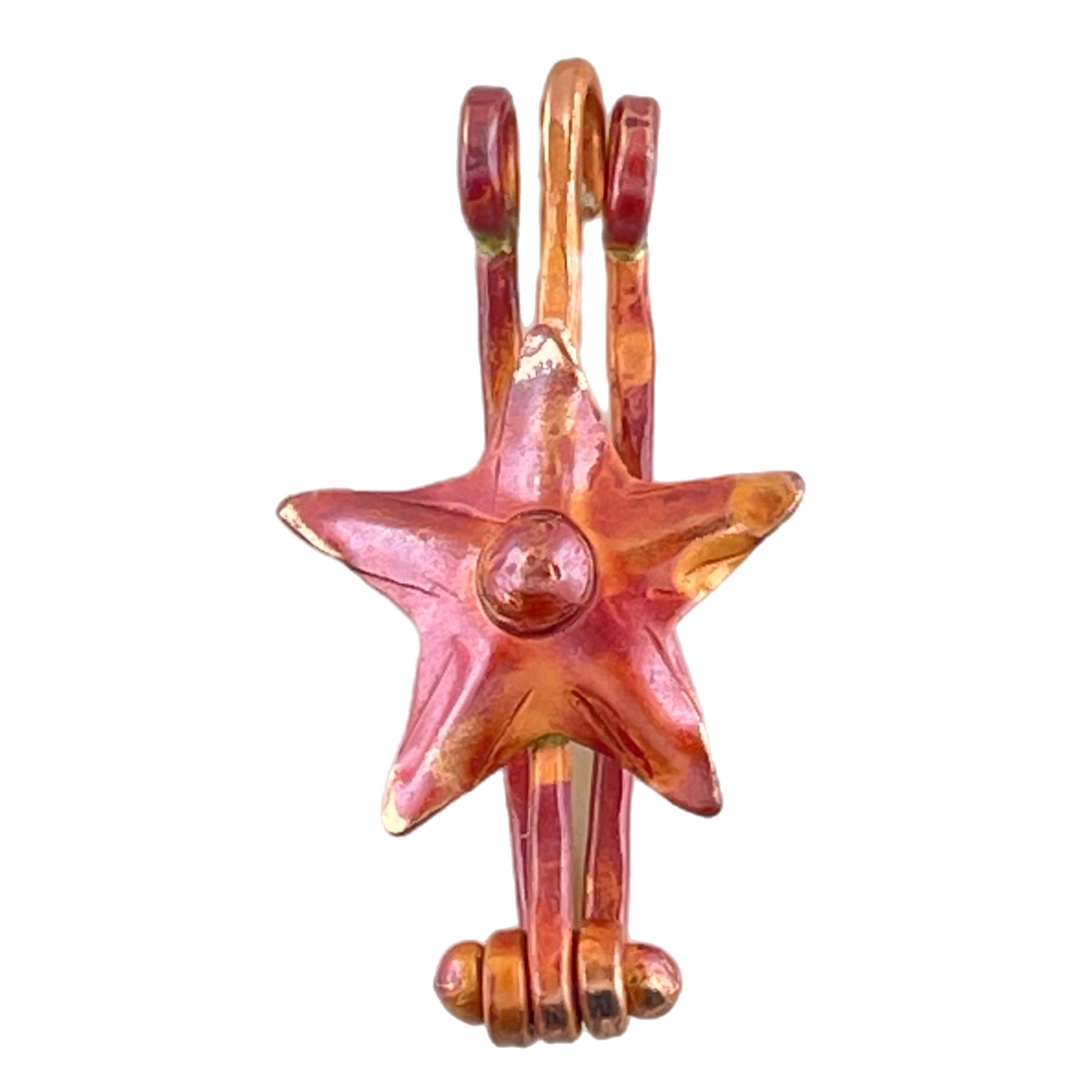Handmade copper star donut bail with repoussé texture, red-orange torch-fired patina, and hinged mechanism by Patricia Healey