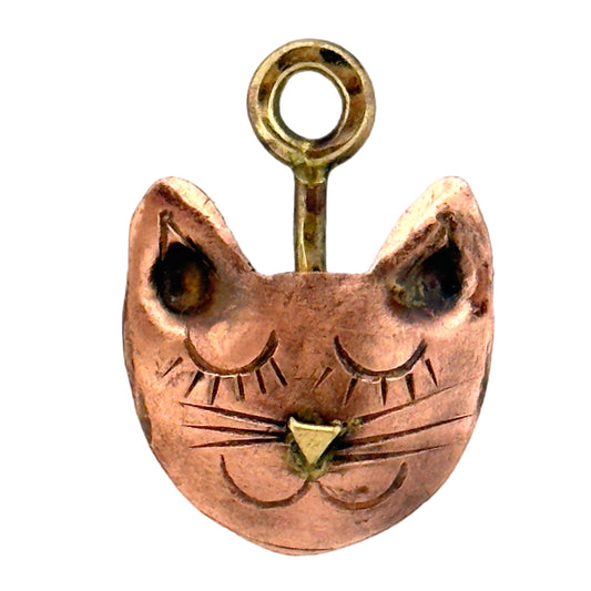Handmade sleepy cat copper charm with brass nose and loop by Patricia Healey Copper