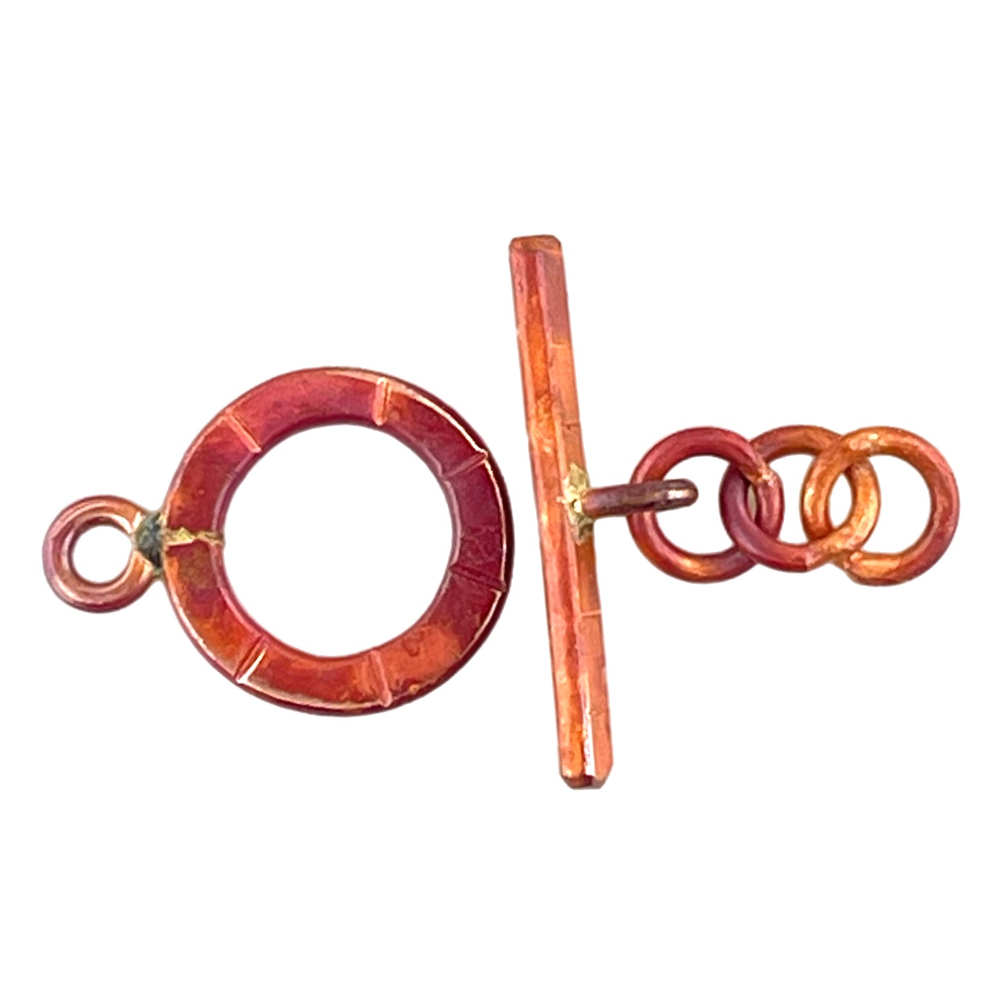 Handmade red patina copper toggle clasp with short lead chain and stamped details