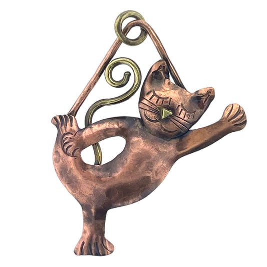 Copper yoga cat pendant in warrior pose with brass accents and antiqued patina, handcrafted by Patricia Healey.