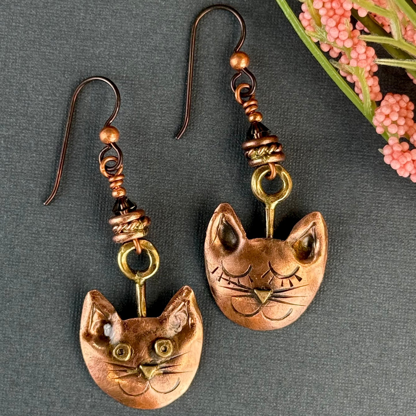 Artisan-crafted copper and brass cat earrings with hypoallergenic niobium ear wires and Swarovski crystals