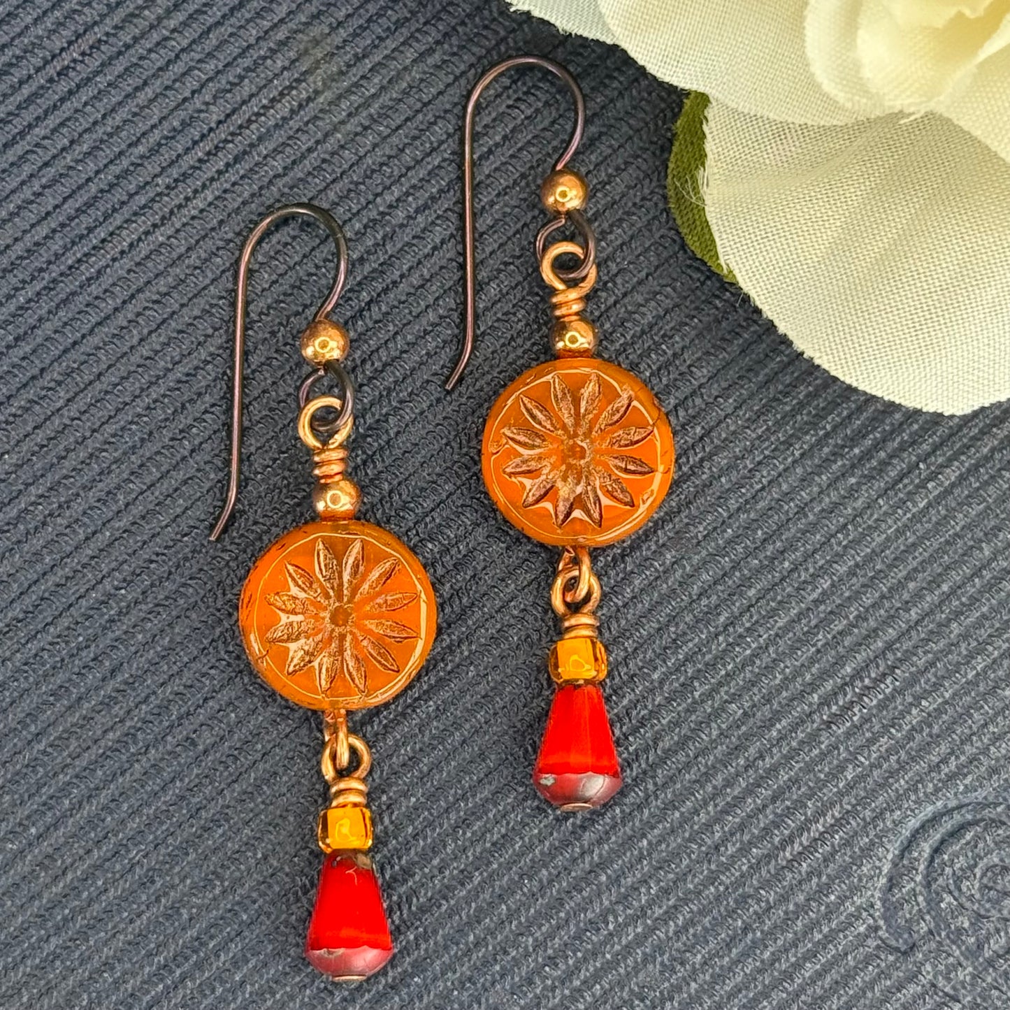 Bohemian copper earrings with red and burnt orange hues, hypoallergenic niobium ear wires
