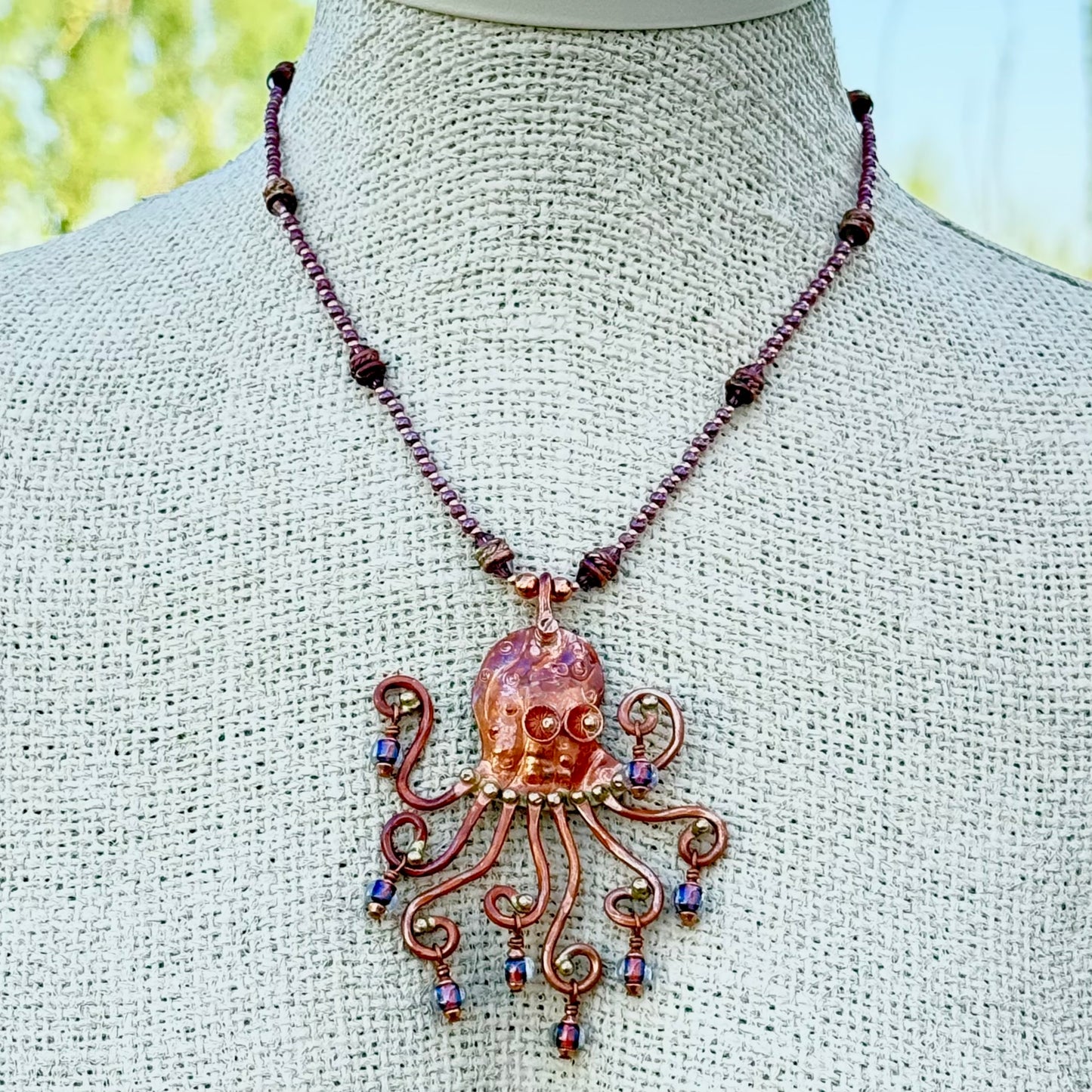 Octopus Necklace in Flame-Finished Copper with Purple Dichroic Beads