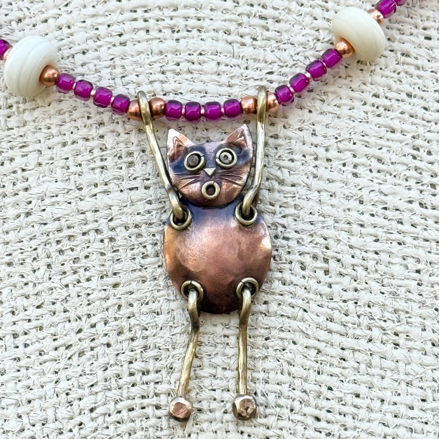 Whimsical Copper Cat Necklace with Artisan Glass