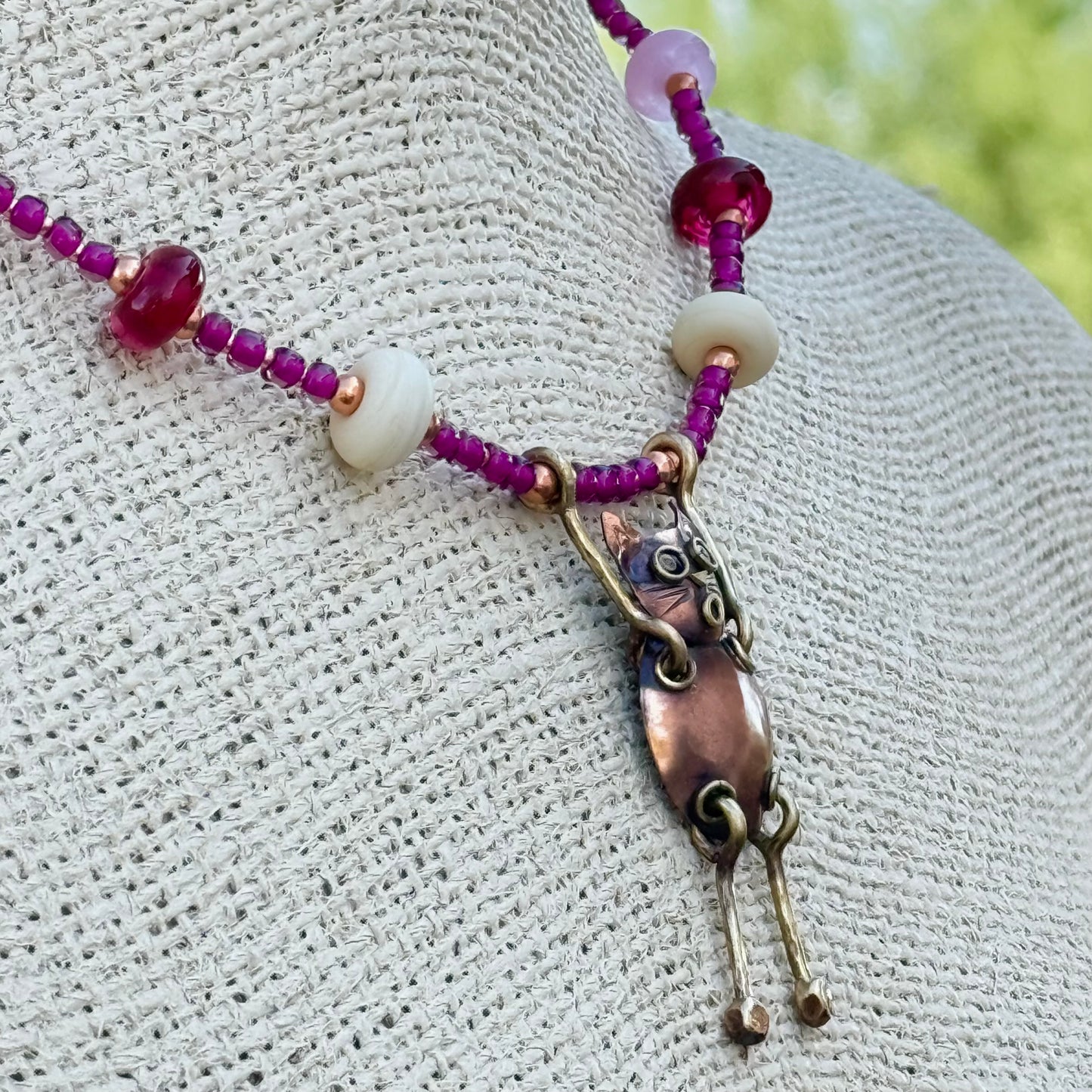 Whimsical Copper Cat Necklace with Artisan Glass