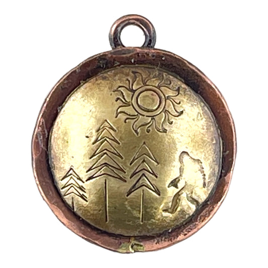 Hand-stamped copper and brass Bigfoot Sasquatch charm with antique finish and copper accents