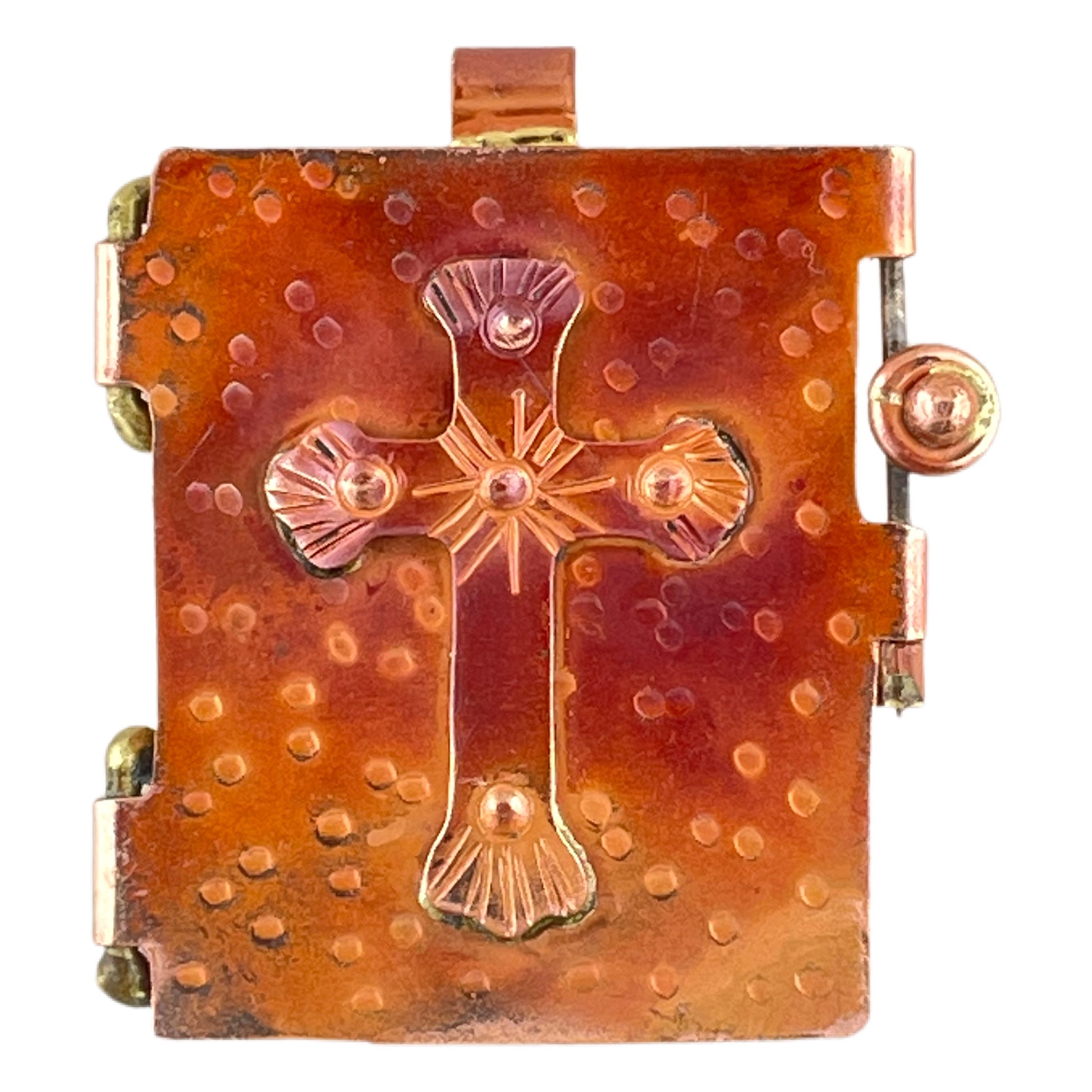 Copper locket pendant with sculpted cross, torch-fired red patina, and brass accents