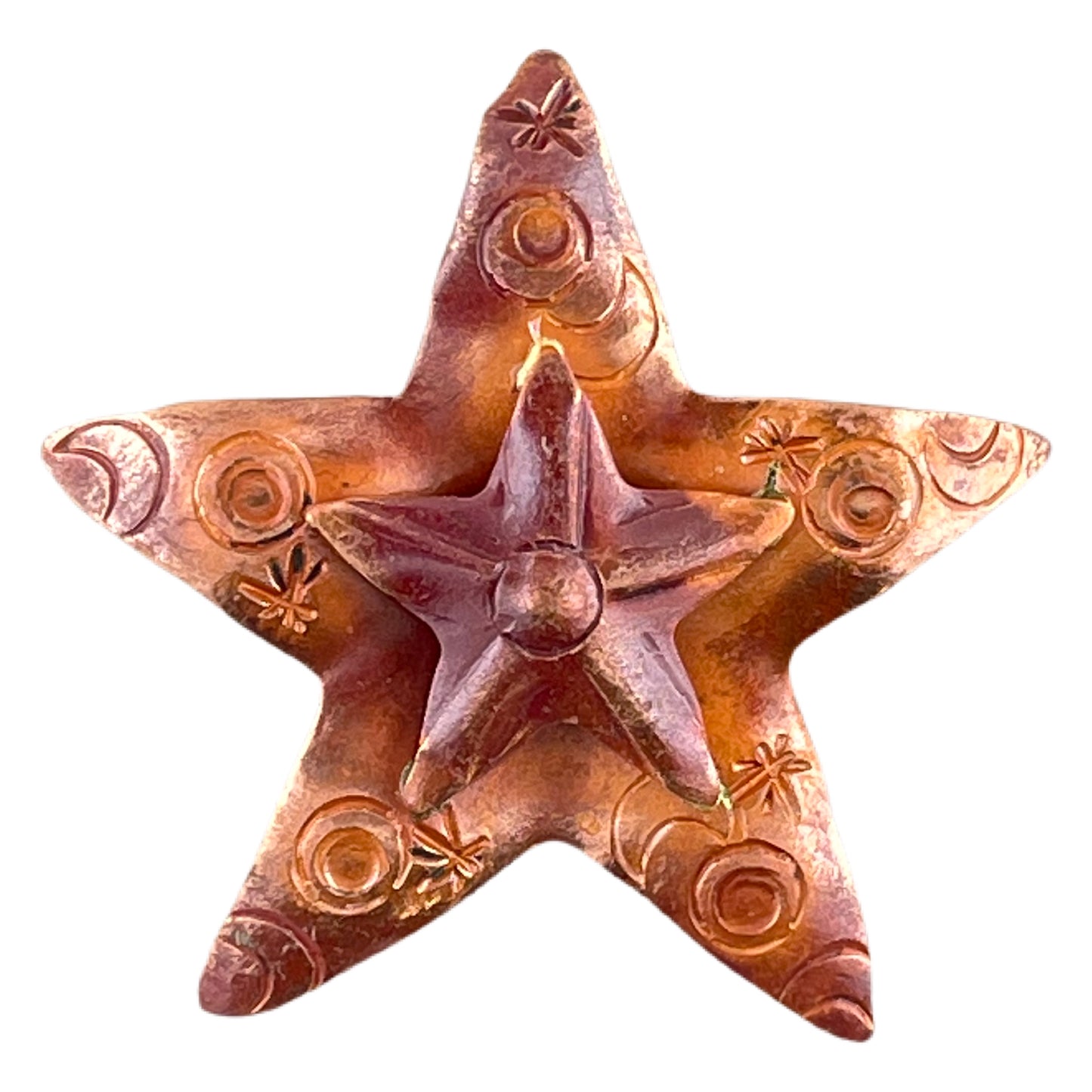 Handmade copper double star pendant with repoussé texture, stamped moon and star accents, and red-orange torch-fired patina by Patricia Healey