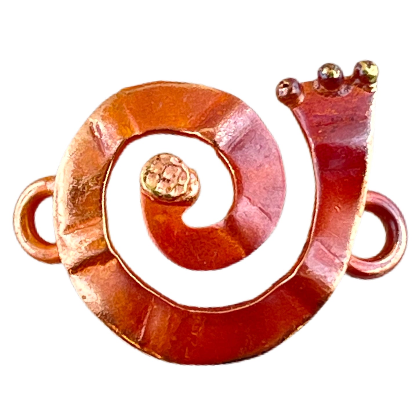 Right-facing copper and brass spiral jewelry link with soldered rings and flame-torched patina