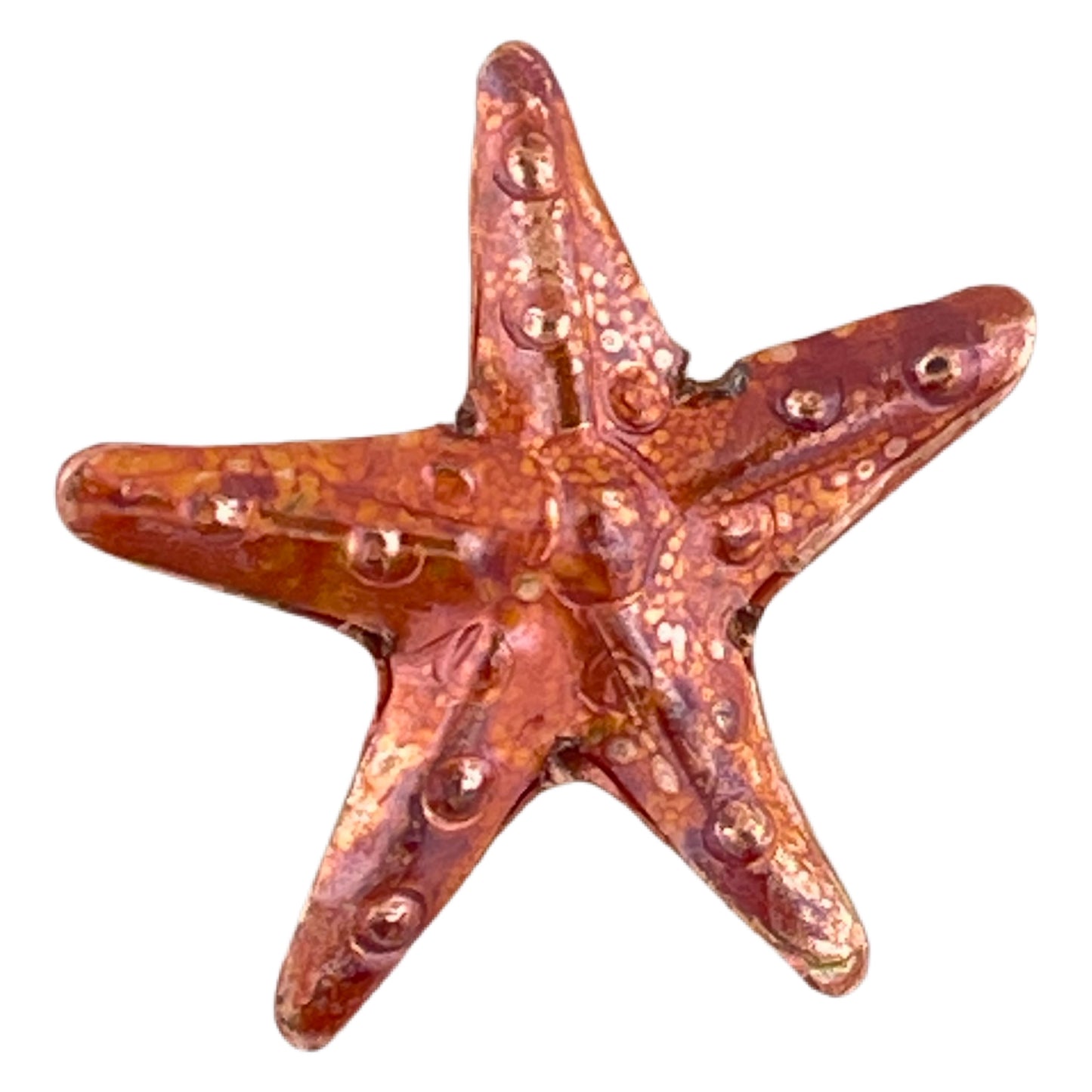 Rustic handcrafted copper starfish bead with ocean texture and flame patina