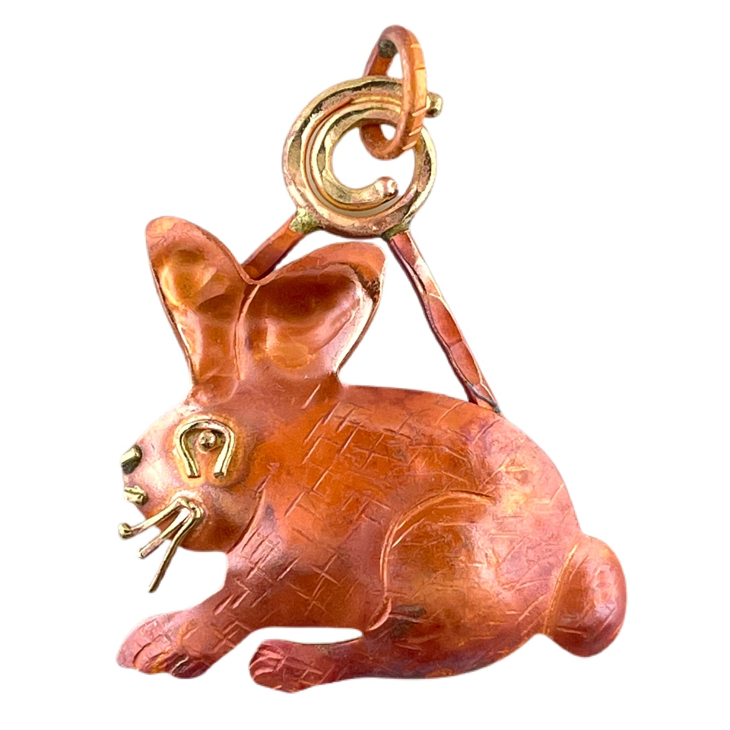Handmade copper and brass cottontail rabbit pendant with stamped detail by Patricia Healey