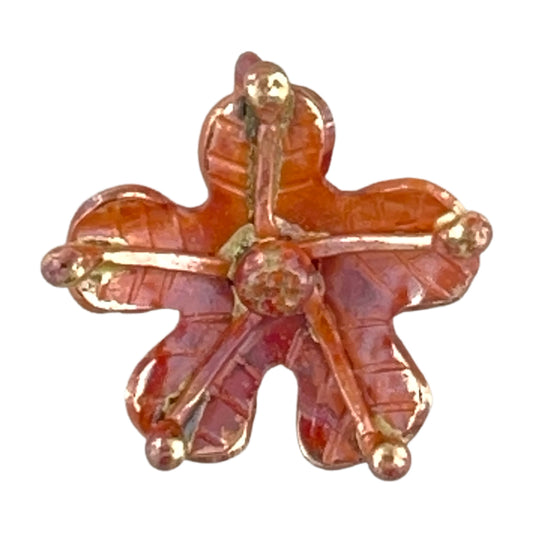 Handmade small copper and brass rose pendant with repoussé form and stamped detail, ideal for earrings, bracelets, or short necklaces by Patricia Healey