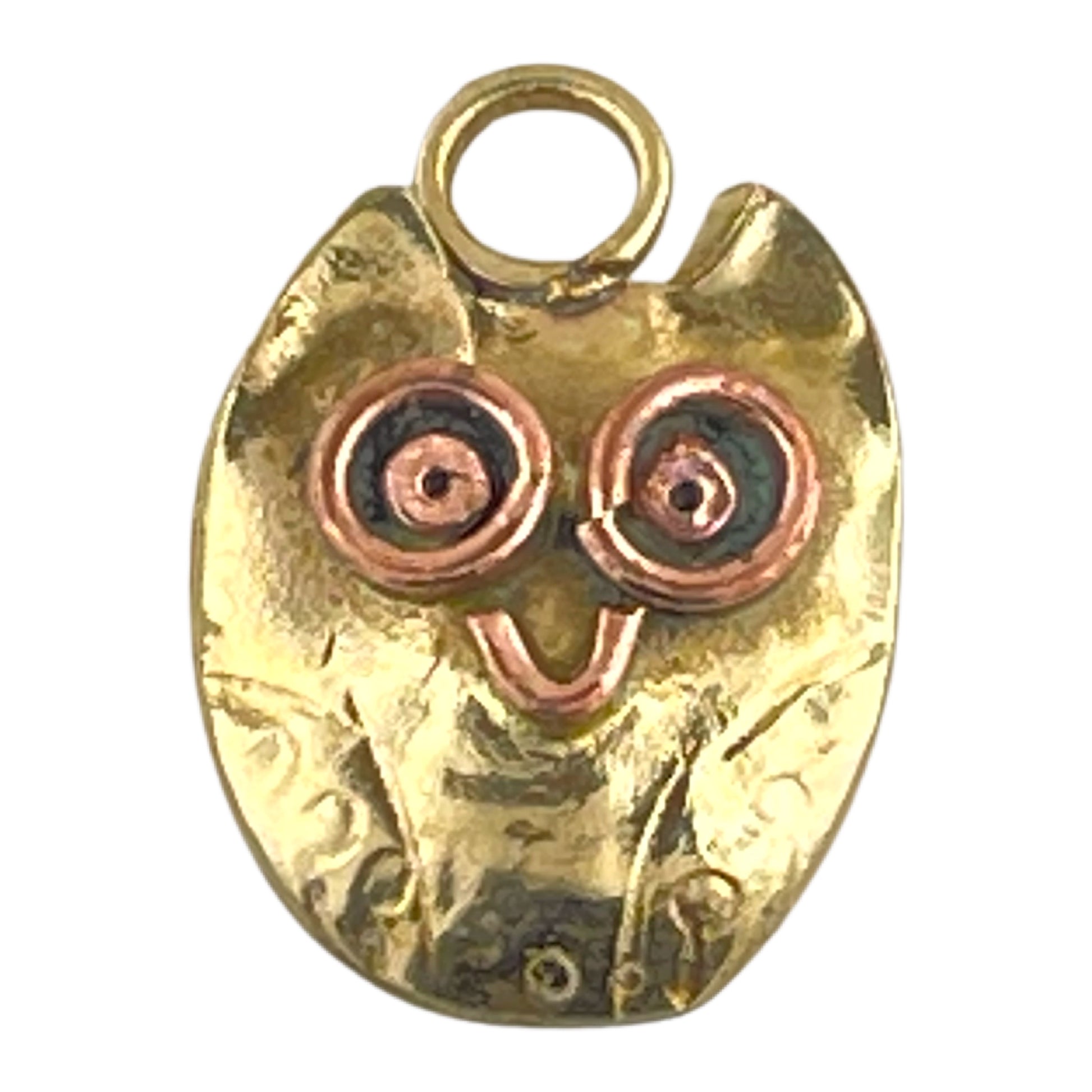 Tiny brass owl charm with copper accents and hand-stamped wings, perfect for earrings or bracelets