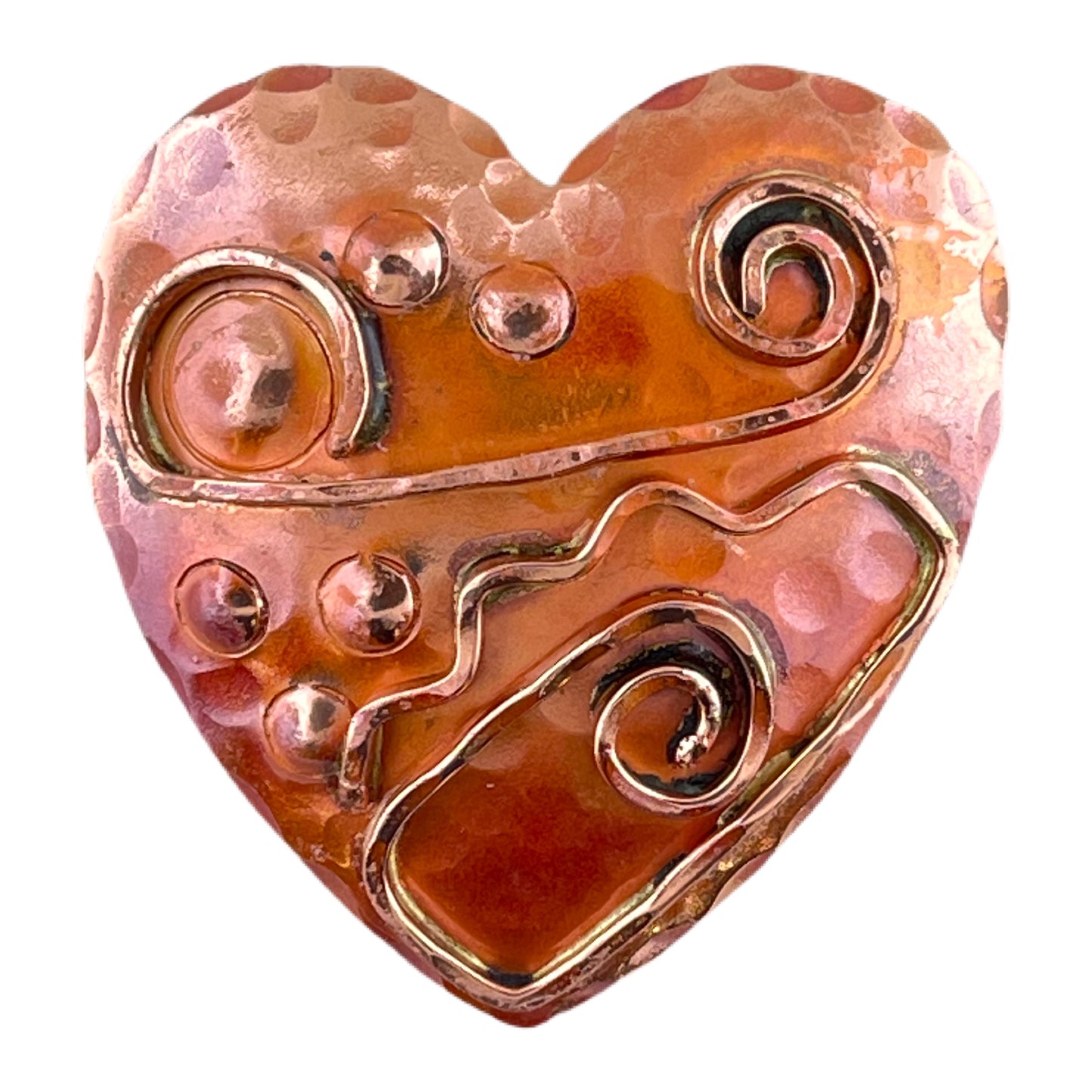 Art Deco-inspired copper heart pendant with hammered wire detail, brass accents, and flame-fired red patina, handcrafted by Patricia Healey.