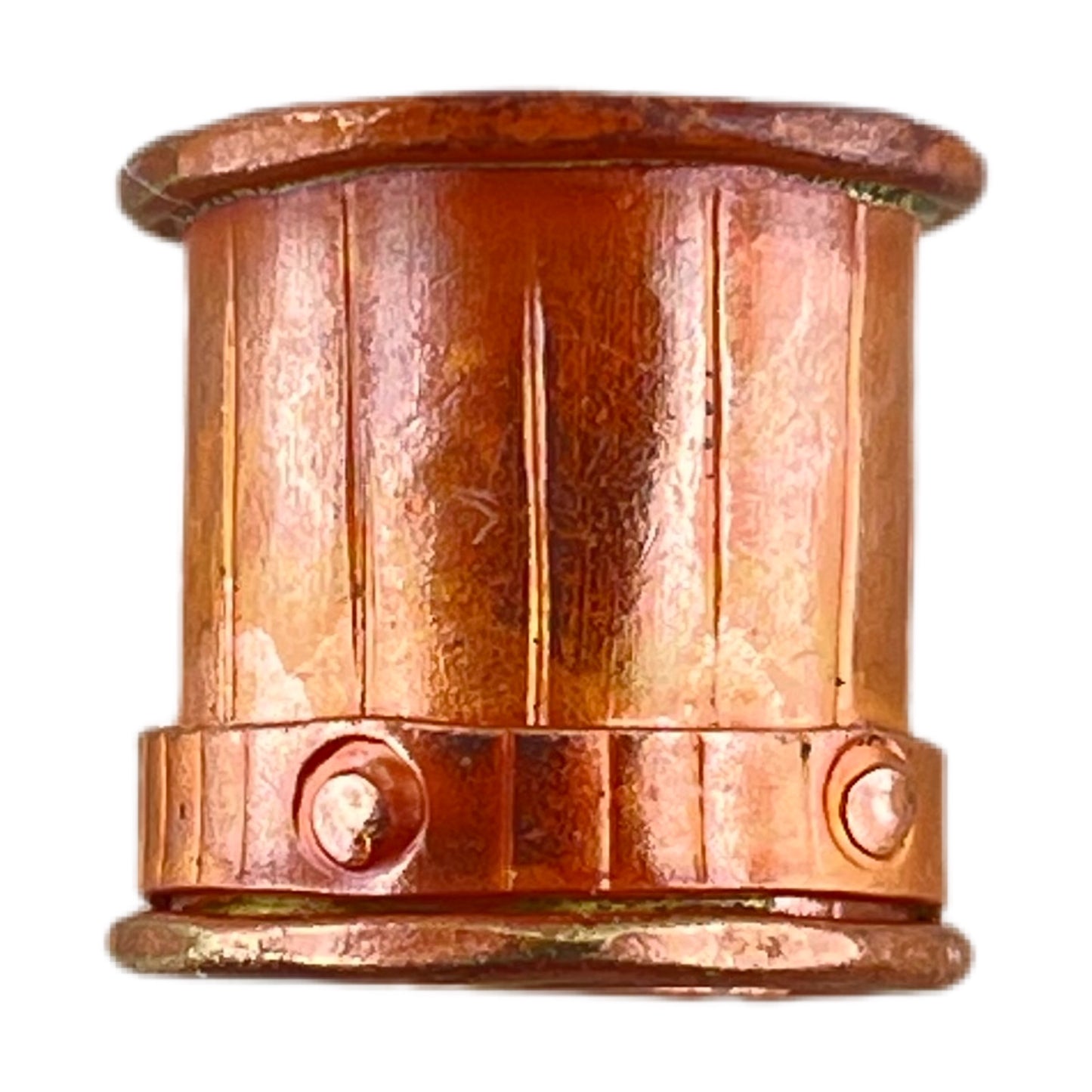 Close-up of copper end cap with brass rivets and stamped detail, flame-torched finish