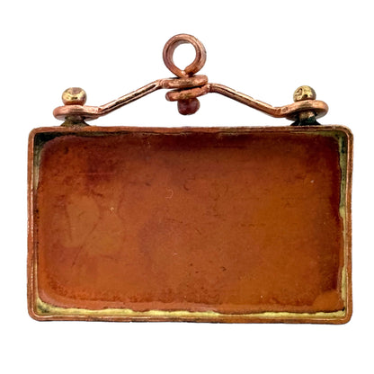 Handmade copper bezel pendant with swinging bail, blank and flame-finished for resin or mosaic artwork.
