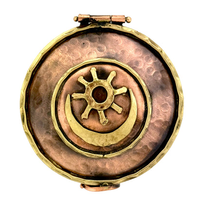 Handmade copper and brass keepsake box with Native American sun and moon symbol, spiral clasp, and antique patina