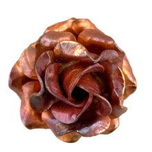 Handmade small copper rose pendant with four hand-formed layers, red-orange torch-fired patina, and sculpted floral texture by Patricia Healey