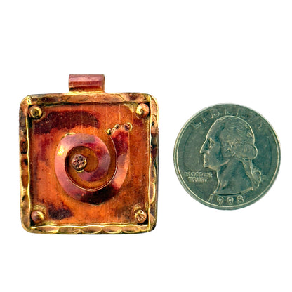 Copper and Brass Spiral Pendant with Textured Frame