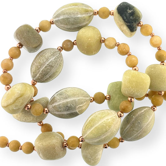18 1/4 inch strand of green stone nugget beads with copper spacer beads for jewelry making
