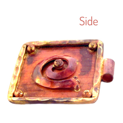Copper and Brass Spiral Pendant with Textured Frame