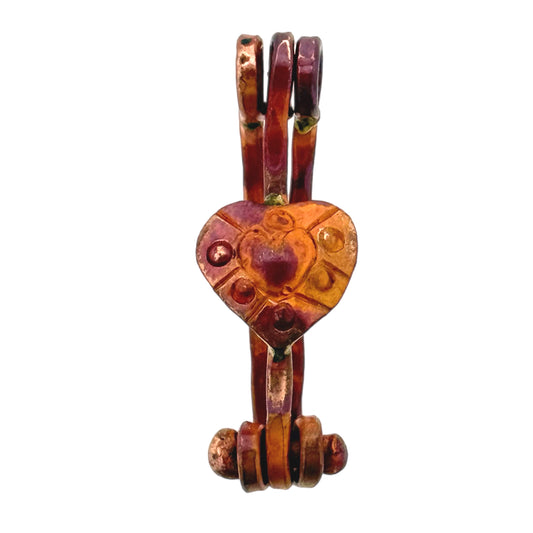 Small textured heart-shaped copper doughnut bail with hinge and red patina for donut pendants