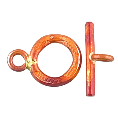 Small handmade copper toggle clasp with hammered texture and red flame finish