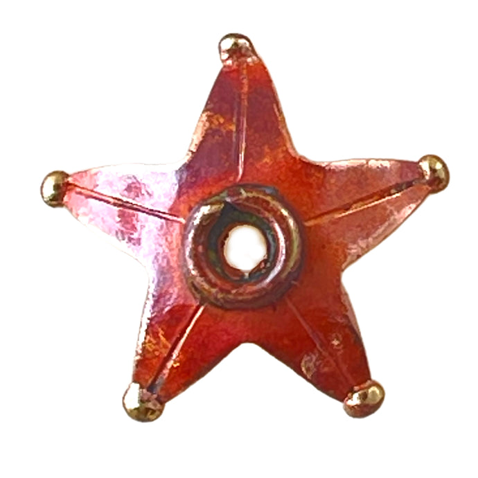 Handmade copper star bead cap with red-orange patina and brass accents, slightly adjustable for various bead sizes by Patricia Healey
