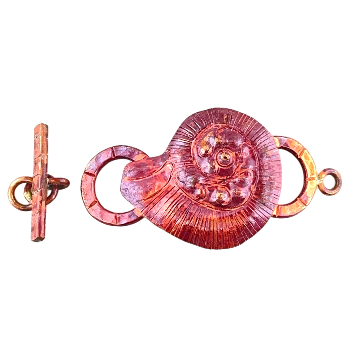 Copper toggle clasp shaped like a textured nautilus shell with bar and lead chain