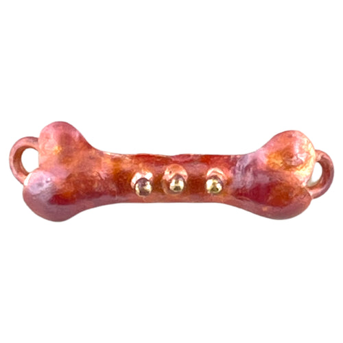 Handcrafted small copper bone link with three brass dots and red flame patina, designed by Patricia Healey for dog-themed jewelry