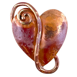 Copper heart pendant with pounded wire detail and soft spiral, flame-fired red patina, handcrafted by Patricia Healey using repoussé technique.