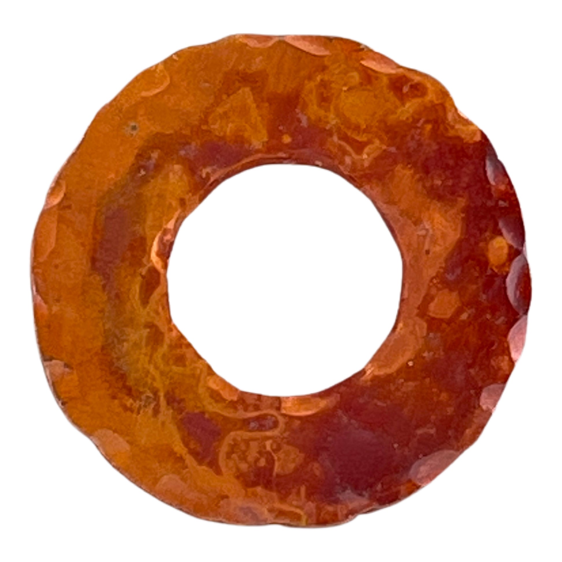 Small handcrafted copper ring with hammered texture and torch-fired red patina, symmetrical design for jewelry making