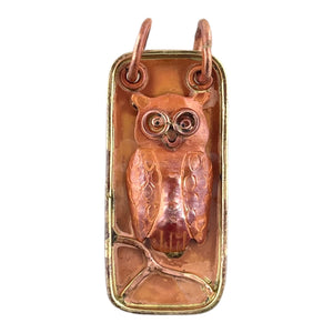 Handcrafted copper owl pendant on branch with brass frame and stamped detail