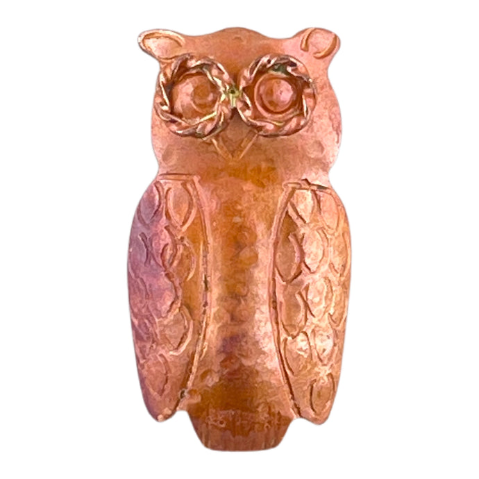 Small copper owl pendant with stamped details and twisted brass eyes, handcrafted by Patricia Healey
