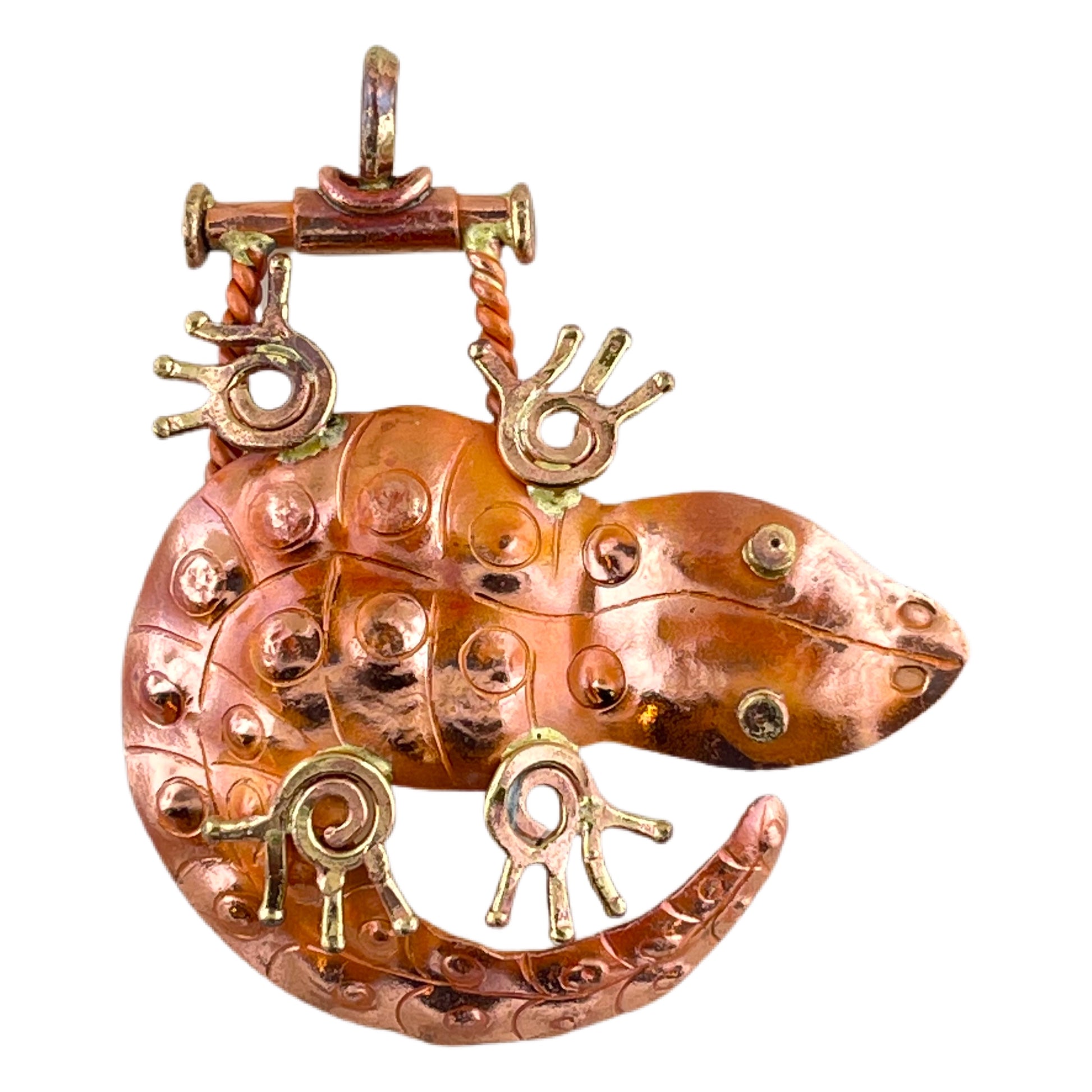 Handcrafted copper lizard pendant with brass detail and red flame patina, designed by Patricia Healey for southwest-inspired jewelry making