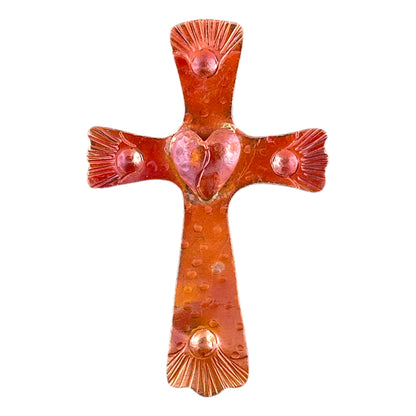 Heart in cross copper pendant, handcrafted with repoussé and hand-stamped texture. Flame-fired in red-orange tones. Designed by Patricia Healey.