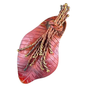 Handmade slender copper flower pendant with repoussé petals, hand-stamped texture, and brass center detail by Patricia Healey
