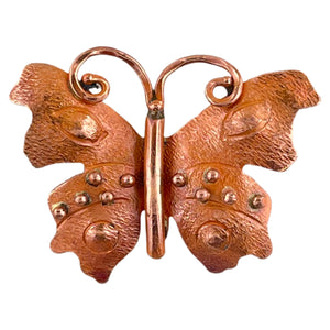 Large copper butterfly pendant with brass accents and flame patina in red-orange tones