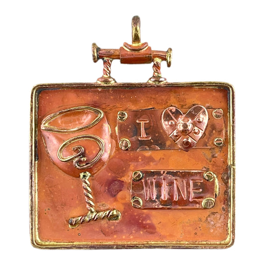 Large handcrafted copper wine glass pendant with brass frame, repoussé texture, and flame-fired red-orange patina. Patricia Healey design.