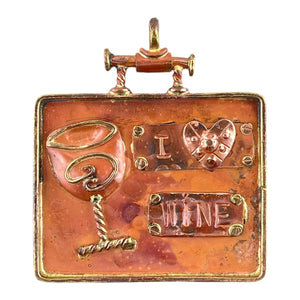 Large handcrafted copper wine glass pendant with brass frame, repoussé texture, and flame-fired red-orange patina. Patricia Healey design.