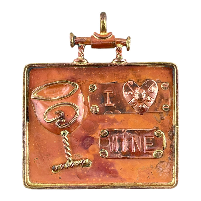Large handcrafted copper wine glass pendant with brass frame, repoussé texture, and flame-fired red-orange patina. Patricia Healey design.