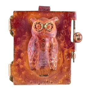 Copper owl locket with brass accents and stamped textures, handcrafted by Patricia Healey
