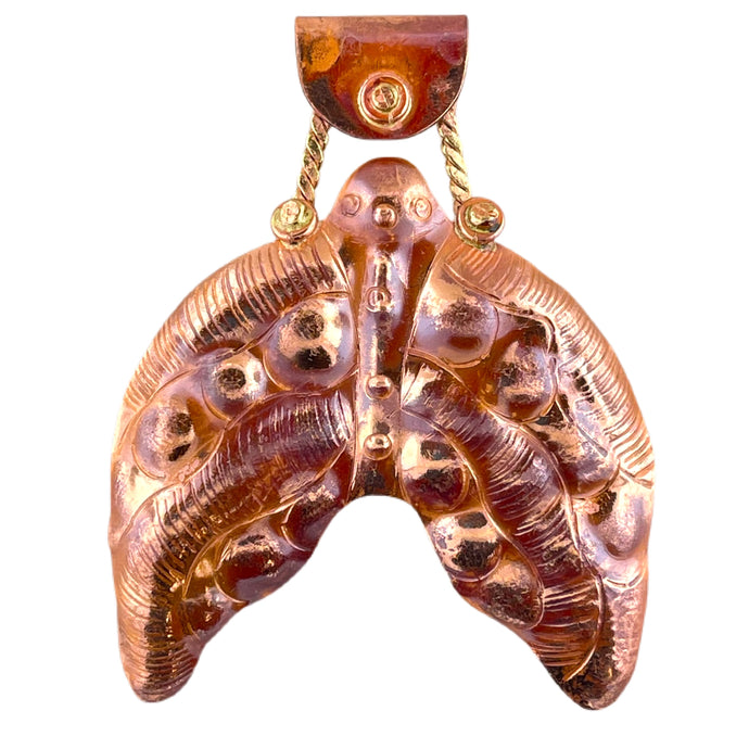 Handcrafted copper mermaid tail pendant with brass accents and red patina by Patricia Healey