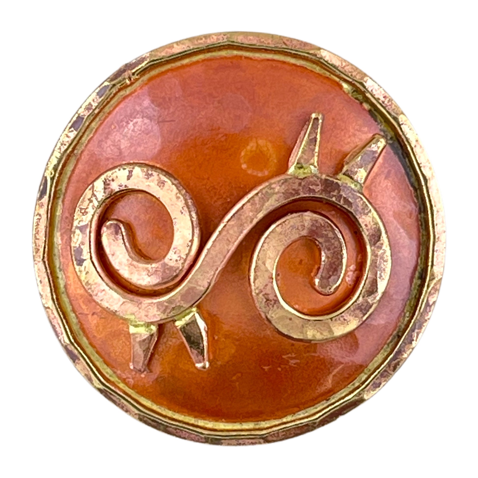 Copper Ahoden symbol pendant with brass accents, hammered texture, and flame-fired patina in red and orange tones. Designed by Patricia Healey.