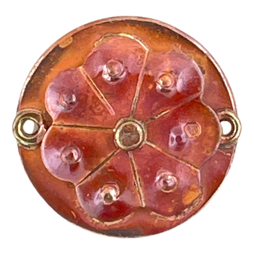 Handmade copper flower link with repoussé detail, hand stamping, red-orange patina, and brass accents by Patricia Healey