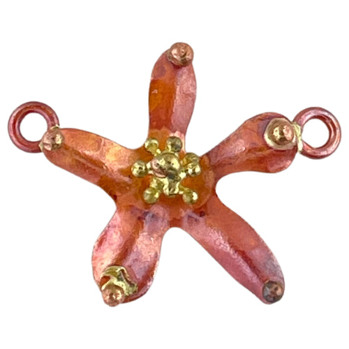 Handmade copper and brass flower link with repoussé texture, hand stamping, and red-orange patina by Patricia Healey