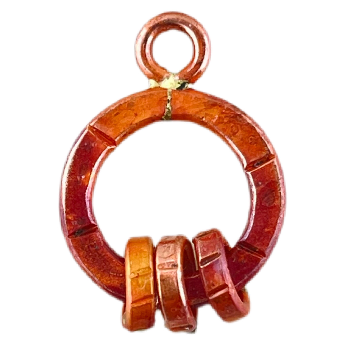 Small handmade copper ring connector with three soldered loops, flame-torched red finish