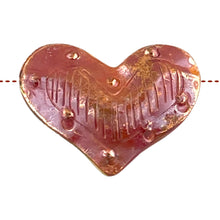 Medium Puffy Heart with Border of Bumps/Lines in Middle-String Side to Side